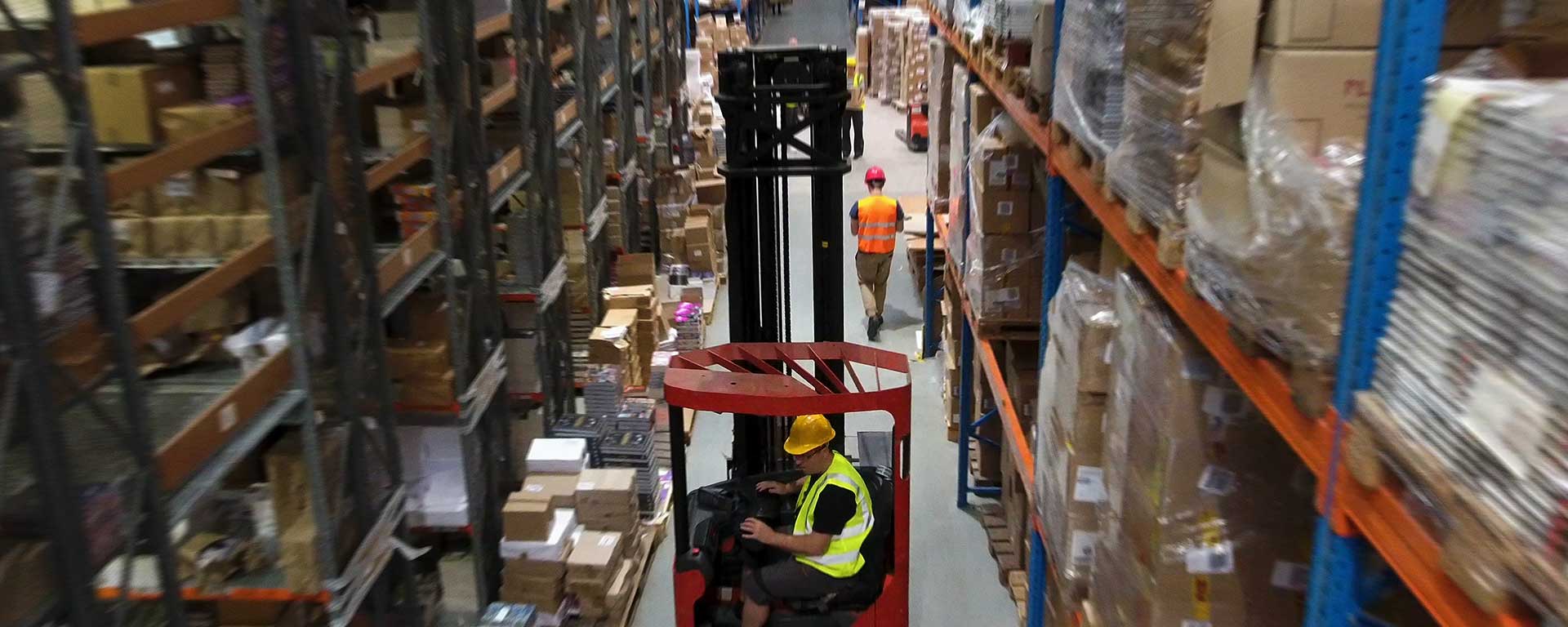 Forklift operates in warehouse