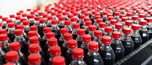 Coca Cola bottles in a production line