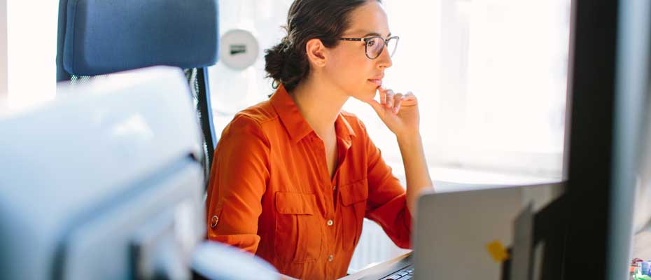 A woman working at her desk