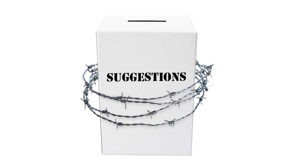 A suggestions box with barbed wire wrapped around it